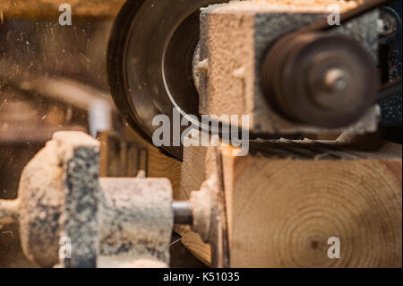 The machine for sampling the groove in a wooden beam Stock Photo