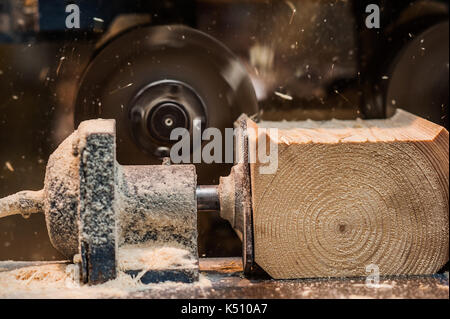 The machine for sampling the groove in a wooden beam detail Stock Photo