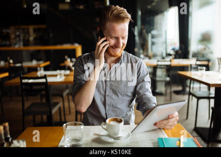Businessman constantly working Stock Photo