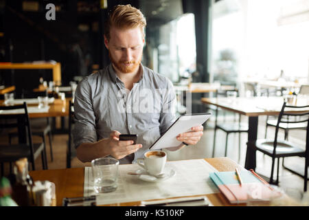 Businessman constantly working Stock Photo