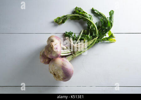Overhead view of turnip on wooden table Stock Photo