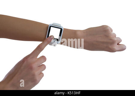 Womans hand using smart watch against white background Stock Photo