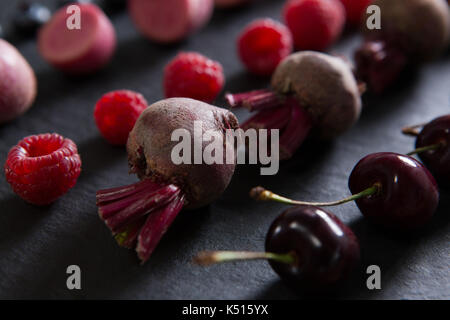 Close-up of fruits and vegetables on chopping board Stock Photo