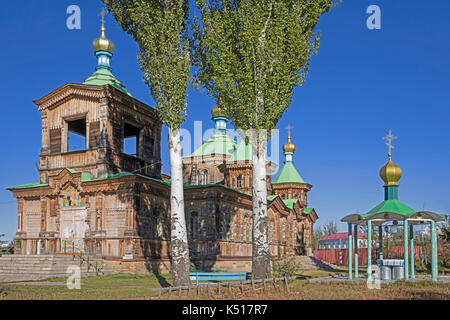 The wooden Russian Orthodox Holy Trinity Cathedral at Karakol / Przhevalsk, Issyk-Kul Region, Kyrgyzstan Stock Photo