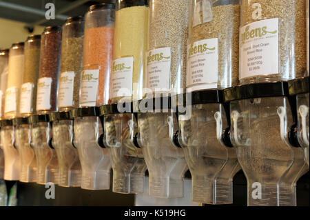 Plastic bulk food containers in an organic grocery store, Vancouver, BC, Canada Stock Photo