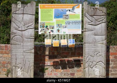 Brownsea Island tourist information sign about all the wildlife you can discover on your visit to the island Stock Photo