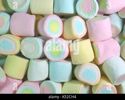 Top View of Pastel Blue, Pink, Yellow Colored Marshmallows for Background, Texture Stock Photo