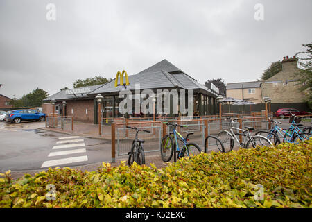 The McDonald's in Cambridge where the staff are holding a strike.However there was no sign of any picket line at lunchtime on Monday September 4th after the strikers left for a meeting in London.The branch was busy and had non striking workers keeping the restaurant  open.   McDonald's workers are staging their first UK strike after walking out at two stores in a dispute over zero-hours contracts and conditions. Workers at Cambridge and Crayford, south-east London, began the 24-hour action at midnight. A union called it a 'brave' move by low-paid staff. Stock Photo