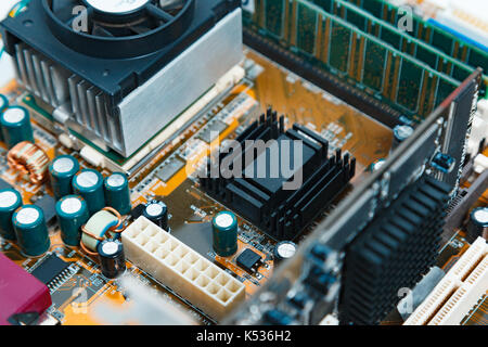 Integrated microprocessor and sockets on circuit of computer motherboard. Stock Photo