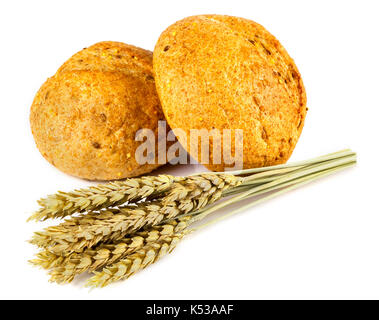 Two buns and spikelets on white background Stock Photo