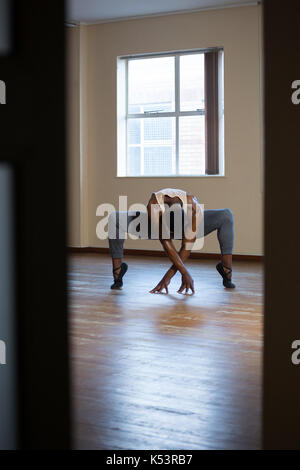 Ballerino practicing ballet dance in the studio Stock Photo