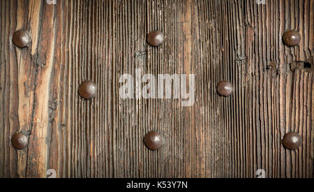 Vintage wooden texture with metal rivets, wood texture for background. Stock Photo