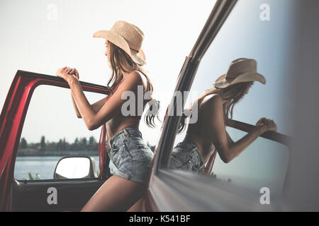 Girl in Black Vest is Posing on Hood Car Stock Photo - Image of cheerful,  charming: 43942068