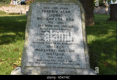 Spike Milligan's Gravestone with the epitaph 'I told you I was ill' written in Gaelic, St Thomas's Church, Winchelsea, East Sussex. UK Stock Photo