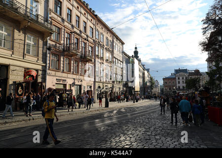 The late afternoon light glints off buildings on Rynok Square in central Lviv, Ukraine, on 28 August 2017. The area is included on the UNESCO World He Stock Photo