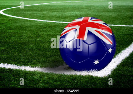 High quality render of soccer ball ready to shoot at at soccer field on green grasses. 3D rendering. Stock Photo