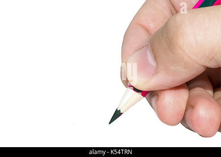 Humans hand holding pencil on isolated white background Stock Photo