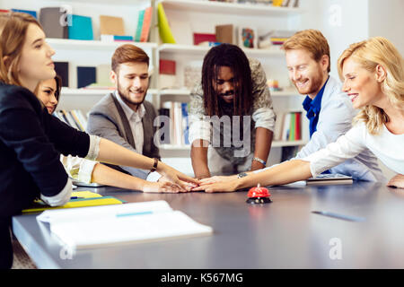 Team of skilled designers and business people Stock Photo