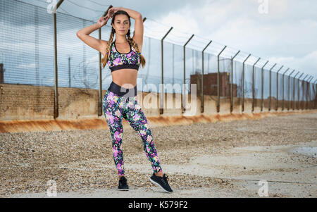 woman stretching before exercise Stock Photo