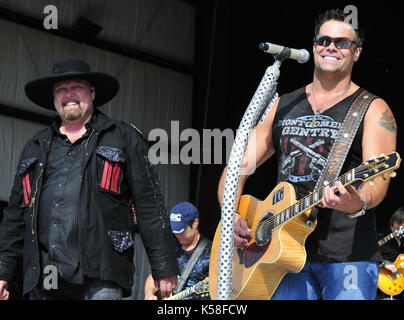 Morristown, Ohio, USA. 17th July, 2011. 08 August 2017 - Troy Gentry of the country duo Montgomery Gentry, died in a helicopter crash in Medford, New Jersey where he was scheduled to perform. With his performing partner Eddie Montgomery, Gentry enjoyed a series of country hits throughout the 2000s, including five Number Ones. He was 50 years old. File Photo: 17 July 2011 - Morristown, Ohio - Eddie Montgomery and Troy Gentry of Montgomery Gentry perform at ''Jamboree In The Hills 2011'' also known as the ''Super Bowl of Country Music.'' Photo Credit: Kelly Blecher/AdMedia (Credit Image: © Kell Stock Photo