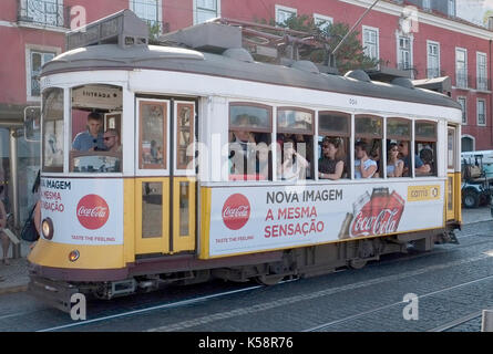 Passengers ride in a tram in Lisbon, Portugal August 25, 2017. © John Voos Stock Photo