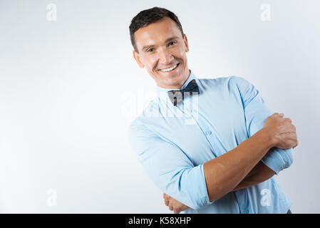 Cheerful nice man feeling happy Stock Photo