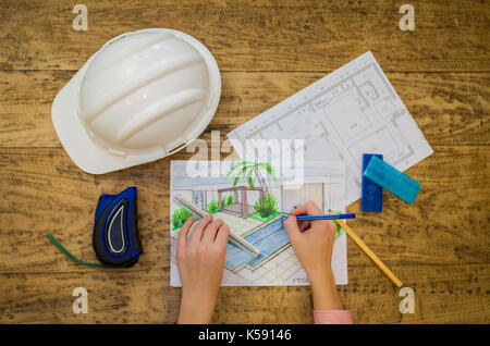 Woman working, projecting on table, architect, engineer. Stock Photo