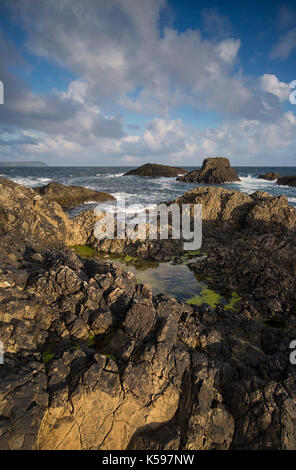 View of the Causeway Coast at Ballintoy Harbour, County Antrim, Northern Ireland, a location for TV series Game of Thrones Stock Photo