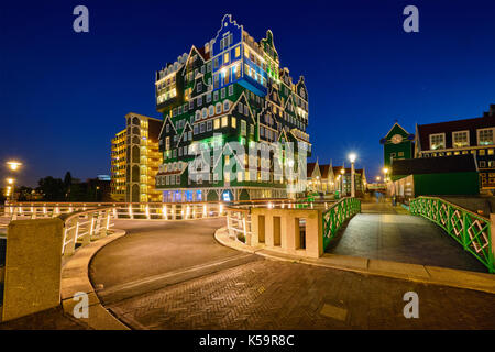 Inntel Hotel in Zaandam illuminated at night, Netherlands Stock Photo