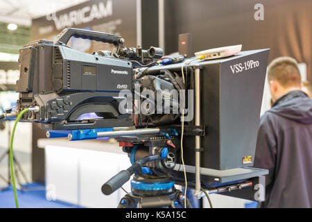 KIEV, UKRAINE - MAY 18, 2017: People visit Panasonic booth on TV and Radio International Fair in ACCO International Exhibition Center. It is the main  Stock Photo