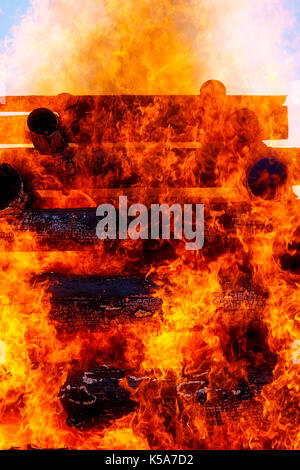 beautiful structure of burning logs and flames of great bonfire. Stock Photo