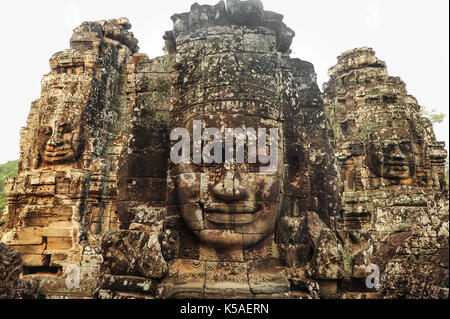 Buddha Face Carved On Stone At Angkor Wat Temple,Cambodia Stock Photo