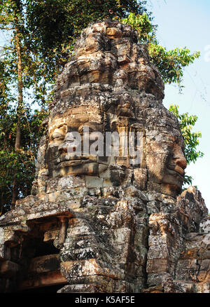 Buddha Face Carved On Stone At Angkor Wat Temple,Cambodia Stock Photo