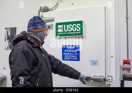 Denver, Colorado - Geoff Hargreaves, curator at the National Ice Core Laboratory, enters the storage room where ice cores are held at -36 degrees C (- Stock Photo