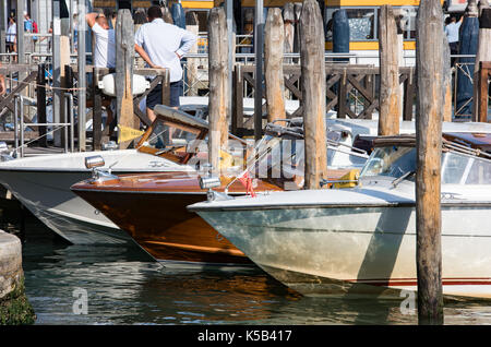 Venice, Wenedig, Wenecja - an old medieval city on water, between canals. View from a sail boat or from the bridges. Stock Photo