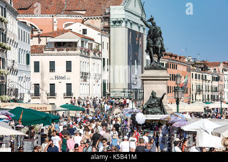 Venice, Wenedig, Wenecja - an old medieval city on water, between canals. View from a sail boat or from the bridges. Stock Photo