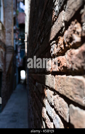 Venice, Wenedig, Wenecja - an old medieval city on water, between canals. View from a sail boat or from the bridges. Stock Photo