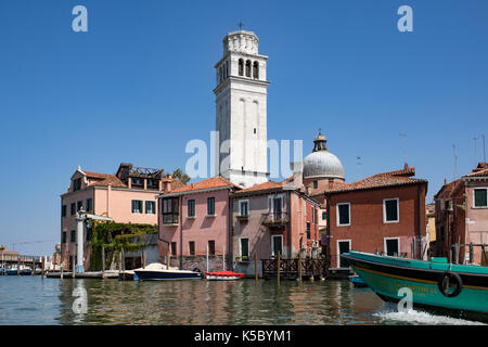 Venice, Wenedig, Wenecja - an old medieval city on water, between canals. View from a sail boat or from the bridges. Stock Photo