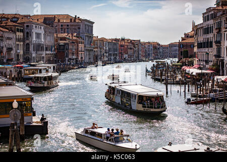 Venice, Wenedig, Wenecja - an old medieval city on water, between canals. View from a sail boat or from the bridges. Stock Photo