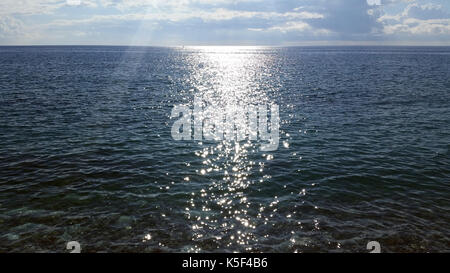 Solar Glare on the Waves on the Water of the Mediterranean Sea, French Riviera Stock Photo