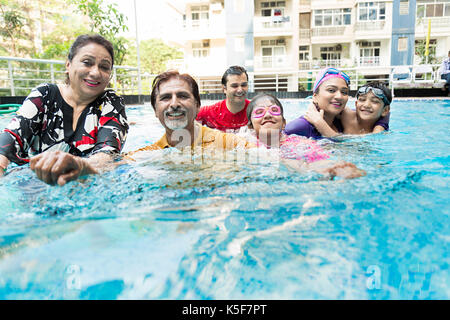 Happy Indian Family Bathing Swimming Pool Having Fun Apartment House Happy Indian Family Bathing Swimming Pool Having Fun Apartment House