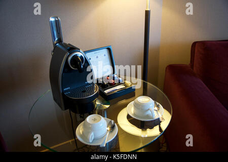 MAINZ, GERMANY - JUL 8th, 2017: Modern capsule coffee machine to make fresh espresso shot in a luxury hotel suite Stock Photo