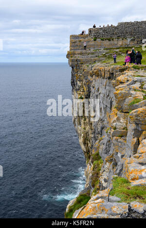 Dramatic sheer cliffs at Dun Aonghasa, a prehistoric stone fort, on Inishmore Island in the Aran Group, County Galway, Republic of Ireland Stock Photo