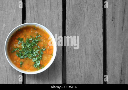 soup for the soul on wooden table Stock Photo