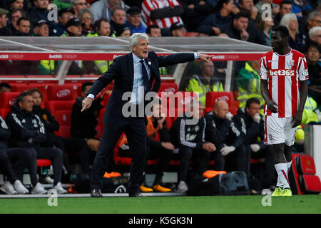 Stoke-on-Trent, UK 09th Sep, 2017 Stoke City Manager Mark Hughes gestures during the Premier League match between Stoke City and Manchester United at Bet365 Stadium on September 9th 2017 in Stoke-on-Trent, England. (Photo by Daniel Chesterton/phcimages.com) Credit: PHC Images/Alamy Live News Stock Photo