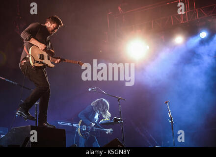 Hoppegarten, Germany. 9th Sep, 2017. The British Folk-Rock band Mumford & Sons with singer and guitarist Marcus Mumford (l) and guitarist 'Country' Winston Marshall performs at the Lollapalooza festival in Hoppegarten, Germany, 9 September 2017. The music festival is held over two days on the 9 and 10 September. Photo: Jens Kalaene/dpa-Zentralbild/dpa/Alamy Live News Stock Photo