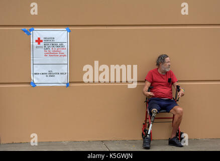 Miami, USA. 9th Sep, 2017. A man rests at a shelter at the Miami-Dade County Fair Expo Center in Miami, as hurricane 'Irma' is approaching, in Miami, Florida, the United States, Sept. 9, 2017. About 5.6 million people in Florida have been ordered to evacuate, while 54,000 Floridians have taken shelter in 320 shelters across Florida. Forecasters expect the hurricane to hit Florida early Sunday morning. Credit: Yin Bogu/Xinhua/Alamy Live News Stock Photo