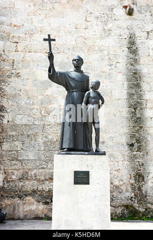 HAVANA, CUBA - JULY 21, 2016: Father Junipero Serra and juaneno Indian boy statue at the Basilica Menor de San Francisco de Asis. Stock Photo