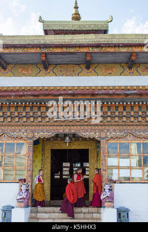 Nuns at the Sangchen Dorji Lhuendup nunnery above Punakha, Western Bhutan. Stock Photo