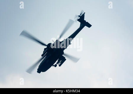 Boeing AH-64 Apache helicopter giving a display. Stock Photo